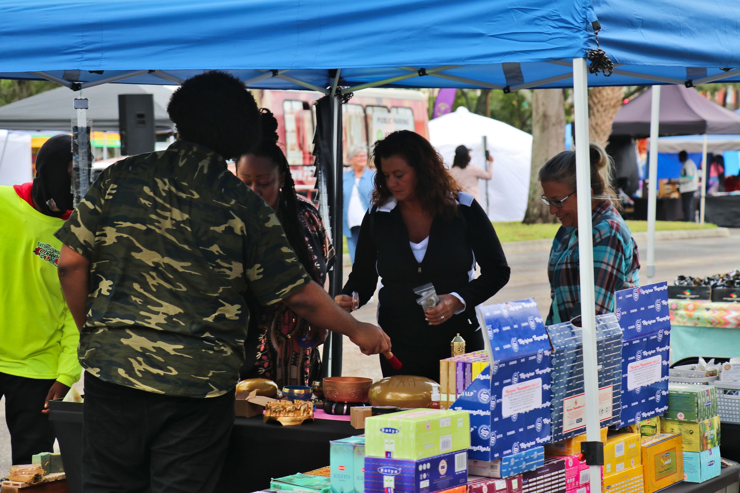 Vendors selling goods at a Saturday Shoppes market