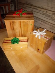 Handcrafted interior/exterior lighted gift boxes.